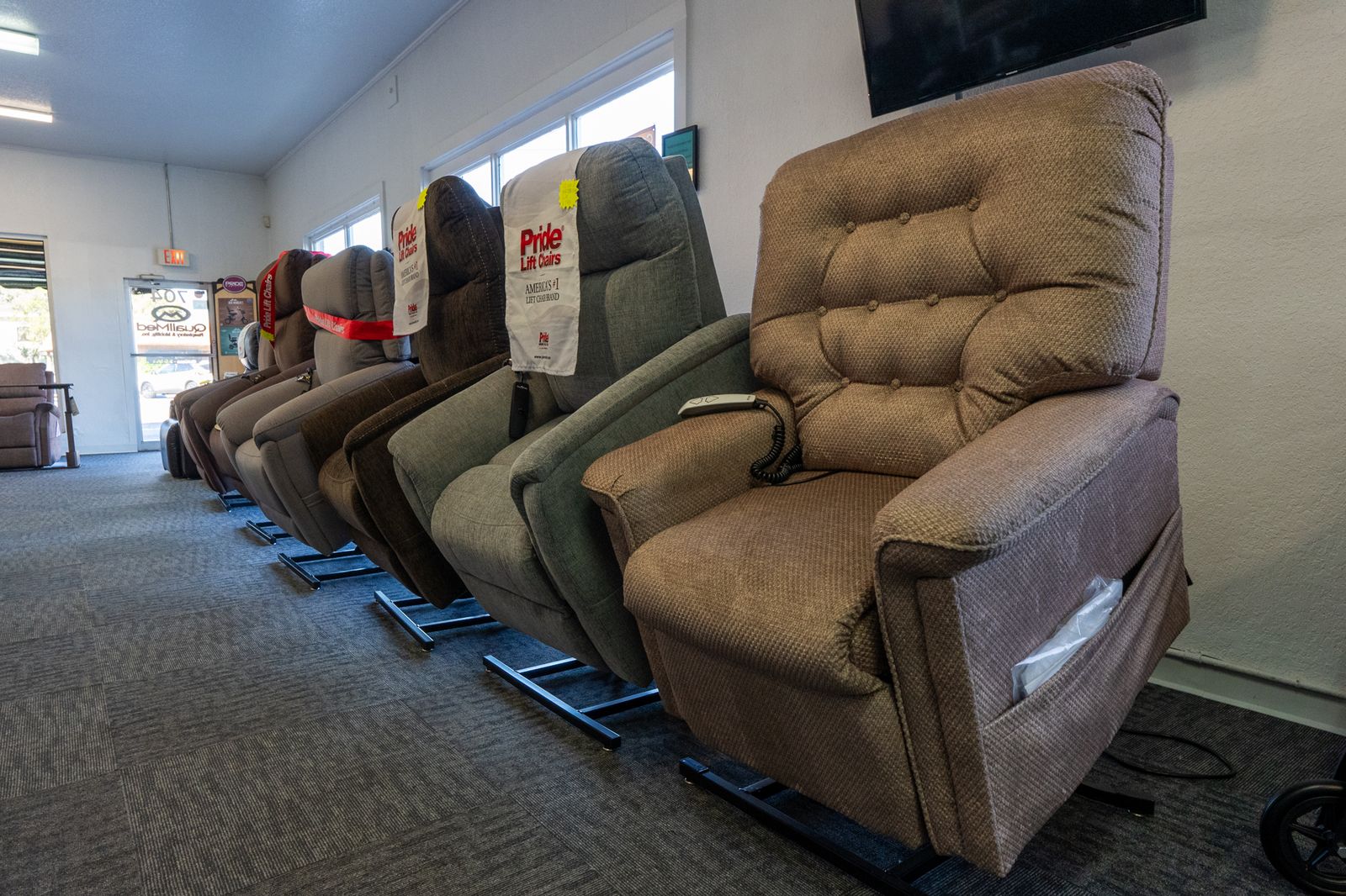 Customer relaxing in a VivaLift! power recliner from America's #1 Lift Recliner Brand, combining style, safety, and therapeutic features for mobility or balance issues