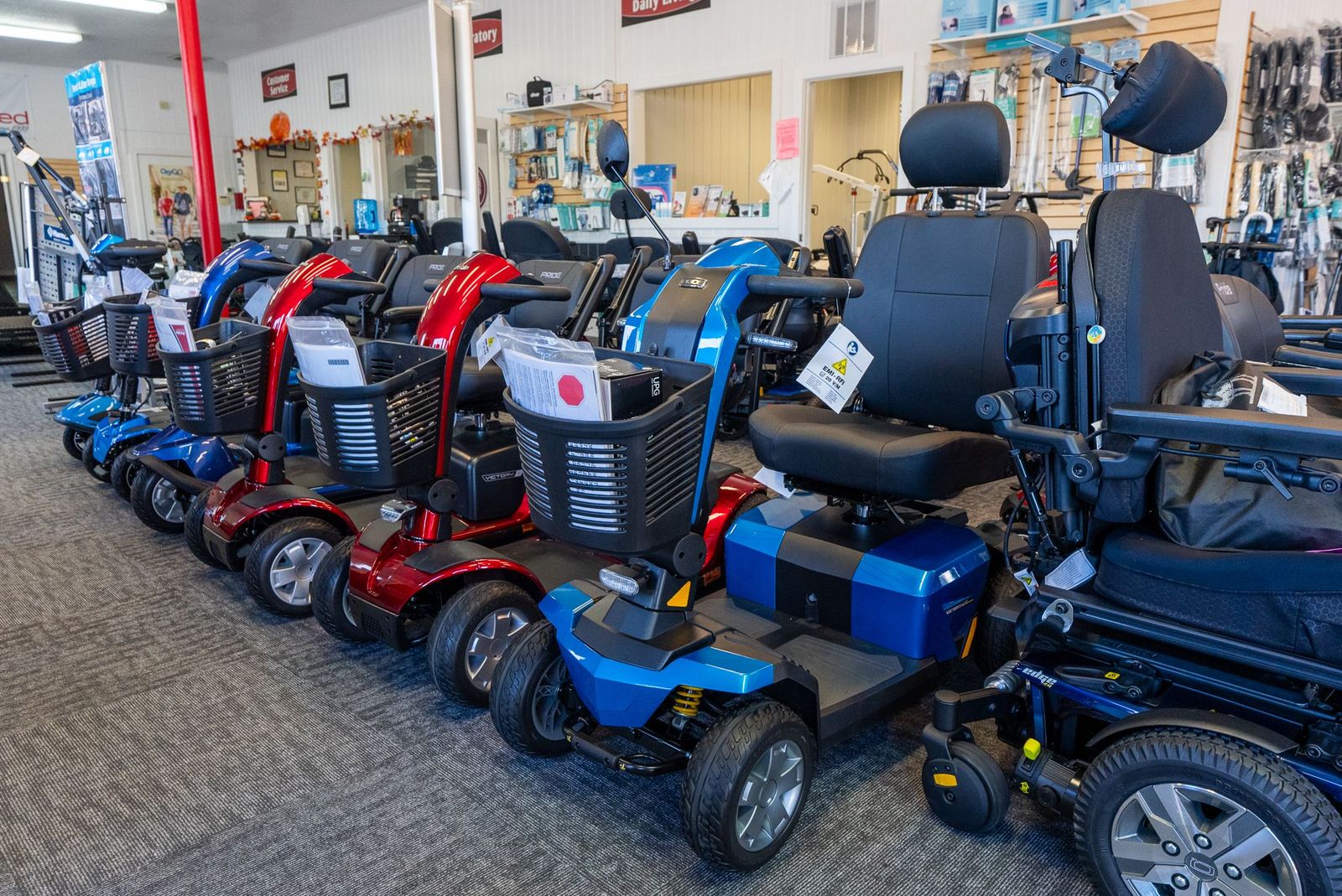 Heavy duty wheelchairs and folding mobility scooters ready for pick-up or delivery at QualiMed, Polk County’s trusted provider of medical mobility equipment